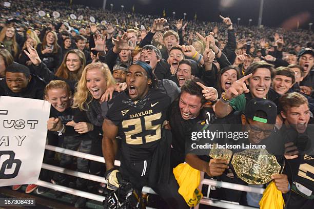 Running back Lache Seastrunk of the Baylor Bears celebrates with fans after their win against the Oklahoma Sooners on November 7, 2013 at Floyd Casey...