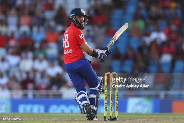 Moeen Ali of England bats during the 5th T20 International between the West Indies and England at the Brian Lara Cricket Academy on December 21, 2023...