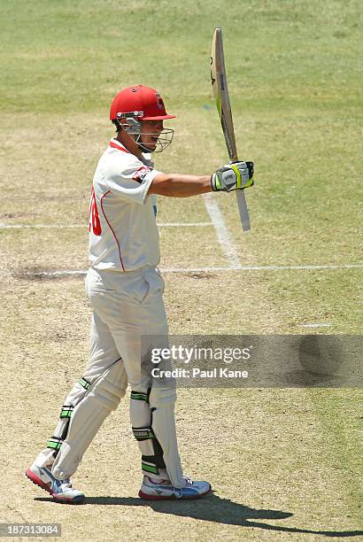 Kelvin Smith of the Redbacks celebrates his half century during day three of the Sheffield Shield match between the Western Australia Warriors and...