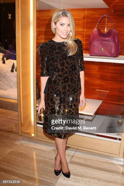 Mollie King attends the launch of Louis Vuitton Townhouse at Selfridges on November 7, 2013 in London, England.