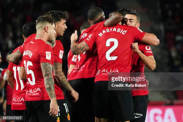 Matija Nastasic of RCD Mallorca celebrates scoring his team's first goal with teammates during the LaLiga EA Sports match between RCD Mallorca and CA...