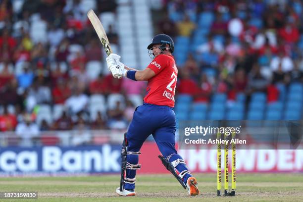 Liam Livingstone of England hits six runs during the 5th T20 International between the West Indies and England at the Brian Lara Cricket Academy on...