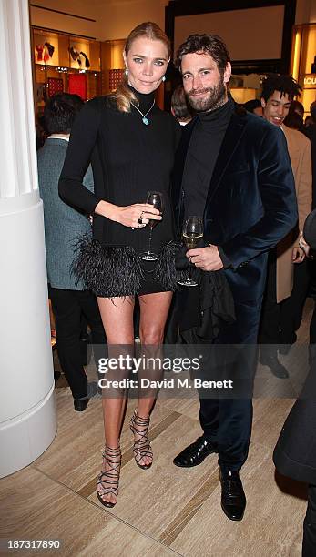 Jodie Kidd and David Blakeley attend the launch of Louis Vuitton Townhouse at Selfridges on November 7, 2013 in London, England.