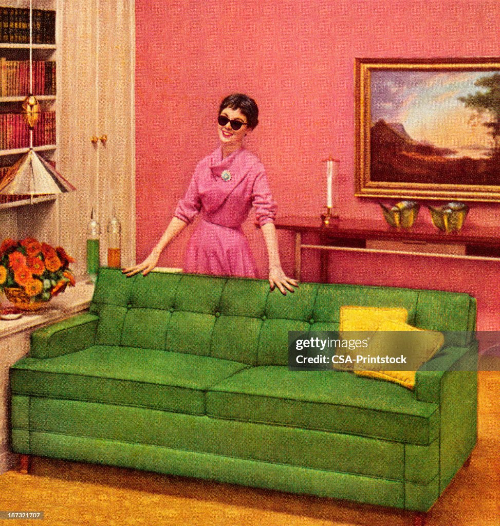 Woman In Sunglasses Standing Behind Couch
