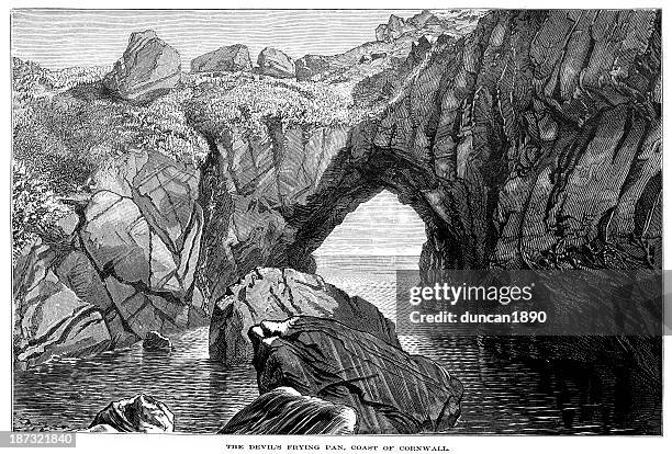 the devils frying pan rock formation - cornwall coast stock illustrations