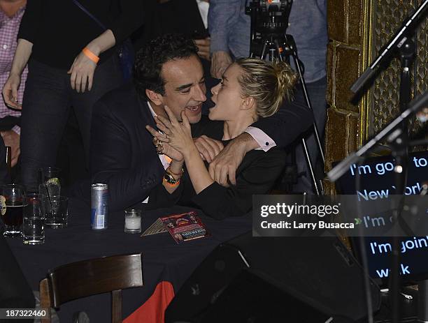 Olivier Sarkosy and Mary Kate Olsen attend performance of Ronnie Wood And Mick Taylor With Special Guests at The Cutting Room on November 7, 2013 in...