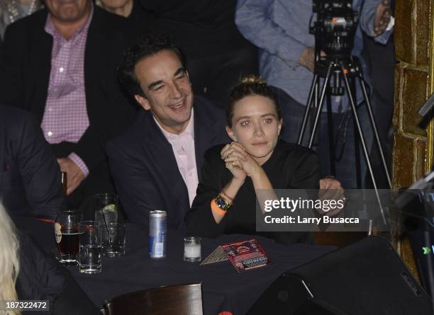 Olivier Sarkosy and Mary Kate Olsen attend performance of Ronnie Wood And Mick Taylor With Special Guests at The Cutting Room on November 7, 2013 in...