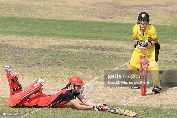 Jenny Wallace of the Fury appeals for a run-out as Tahlia McGrath of the Scorpions makes her ground during the WT20 match between South Australia and...