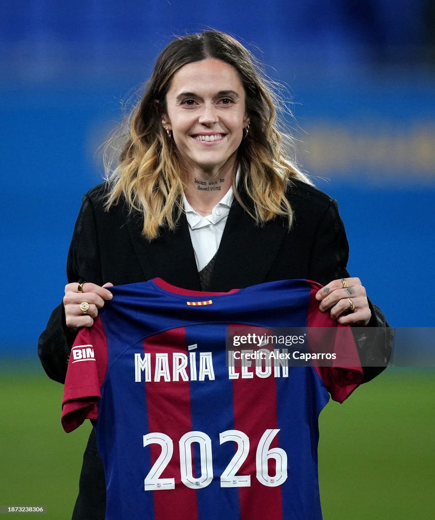 Mapi Leon of FC Barcelona poses for a photo whilst holding a shirt ...