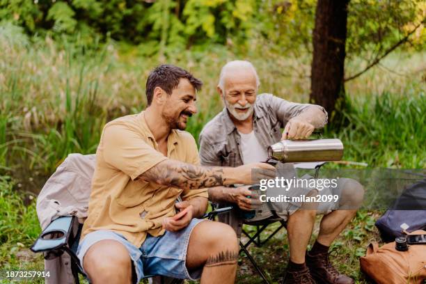 father and son camping - grandpa son stock pictures, royalty-free photos & images