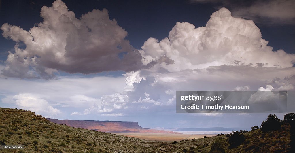 Vermillion Cliffs seen through notch in foreground