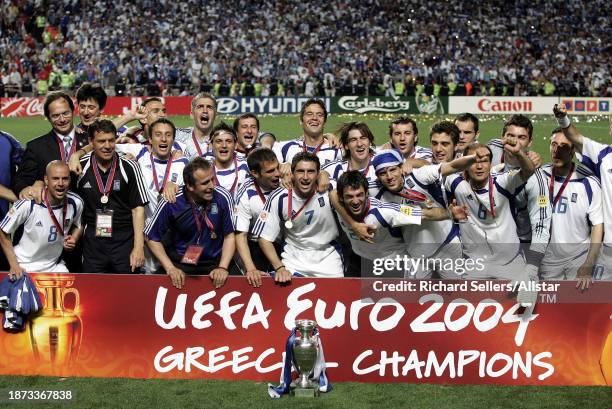 July 4: Captain Theodoros Zagorakis and Manager Otto Rehhagel with other Greek Players celebrates with European Championship Trophy after winning the...