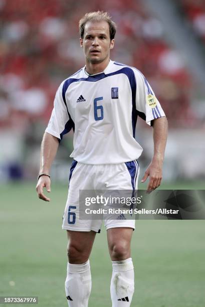 July 4: Angelos Basinas of Greece in action during the UEFA Euro 2004 Final match between Portugal and Greece at Stadium Of Light on July 4, 2004 in...