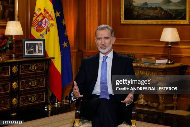 Spain's King Felipe VI delivers his traditional Christmas Eve speech publicly broadcasted at La Zarzuela Royal Palace in Madrid on December 24, 2023.