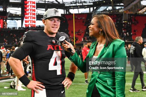 Atlanta quarterback Taylor Heinicke is interviewed by Fox's Kristina Pink following the conclusion of the NFL game between the Indianapolis Colts and...