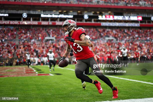 Mike Evans of the Tampa Bay Buccaneers scores a touchdown during the second quarter of an NFL football game against the Jacksonville Jaguars at...