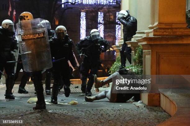 The police intervene in protesters who tried to enter the Belgrade City Council building objecting to the result of general and local elections, in...