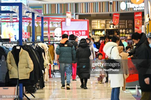 Citizens are shopping on Christmas Eve in Beijing, China, on December 24, 2023.