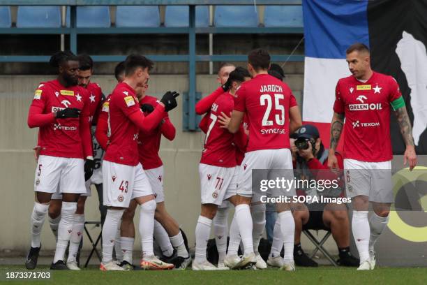 Players of Wisla Krakow celebrate after scoring a goal during Fortuna 1 Polish League 2023/2024 football match between Wisla Krakow and Polonia...