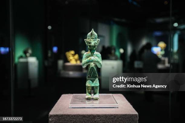 Bronze relic from China's Sanxingdui Ruins is displayed during an exhibition titled "Glory of Bronze Civilization" in the Museum of Shanghai...