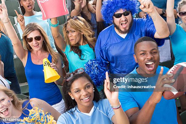 sports fans cheering - foam hand stock pictures, royalty-free photos & images