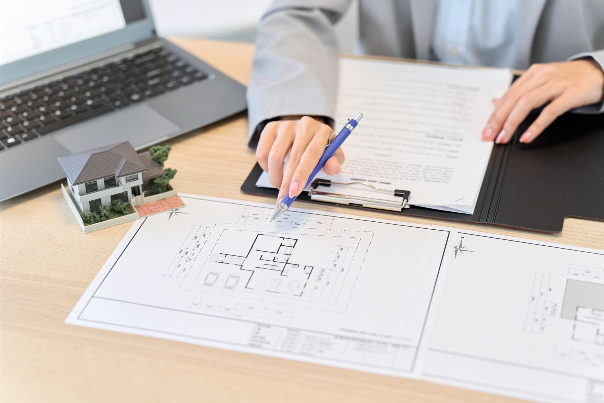 Female salesperson providing real estate information Female salesperson providing real estate information
