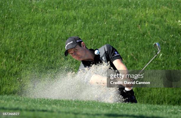 Justin Rose of England plays his third shot at the par 5, 18th hole during the completion of his first round on day two of the 2013 Turkish Airlines...