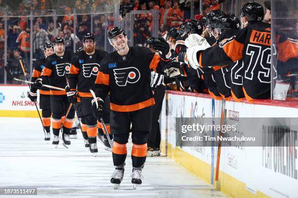 Morgan Frost of the Philadelphia Flyers reacts with teammates after scoring during the first period against the Nashville Predators at the Wells...