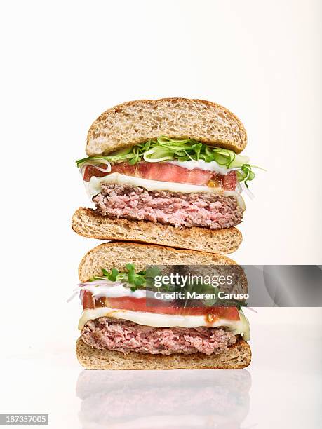 stack of two hamburger halves - halved stock pictures, royalty-free photos & images