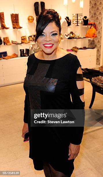 Magazine publisher poses during boutique opening at Town Square on November 7, 2013 in Las Vegas, Nevada.