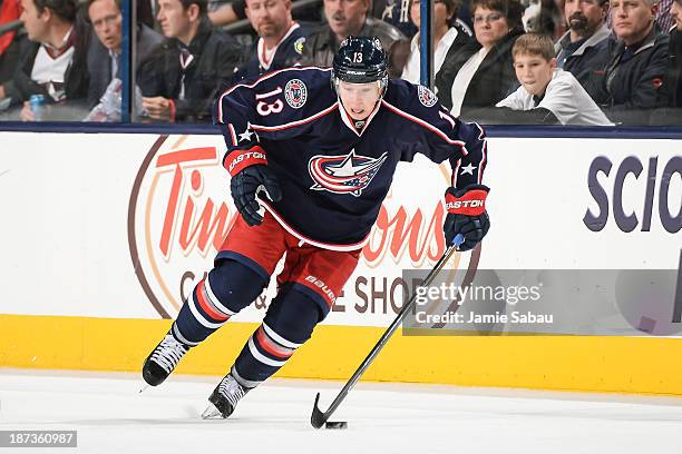 Cam Atkinson of the Columbus Blue Jackets skates with the puck against the Ottawa Senators on November 5, 2013 at Nationwide Arena in Columbus, Ohio.