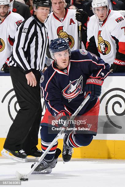 James Wisniewski of the Columbus Blue Jackets skates with the puck against the Ottawa Senators on November 5, 2013 at Nationwide Arena in Columbus,...