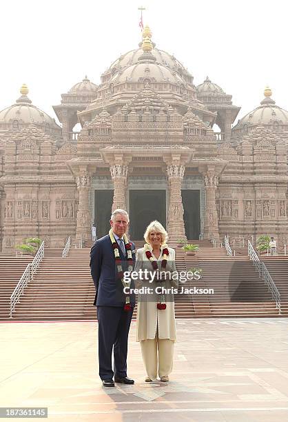 Camilla, Duchess of Cornwall and Prince Charles, Prince of Wales pose outside the Akshardham Temple during day 3 of an official visit to India on...