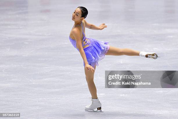 Mao Asada of Japan competes in the women's short program during day one of ISU Grand Prix of Figure Skating 2013/2014 NHK Trophy at Yoyogi National...