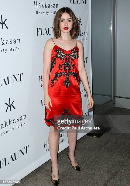 Actress Lily Collins attends Flaunt magazine En Garde! issue launch party on November 7, 2013 in Beverly Hills, California.