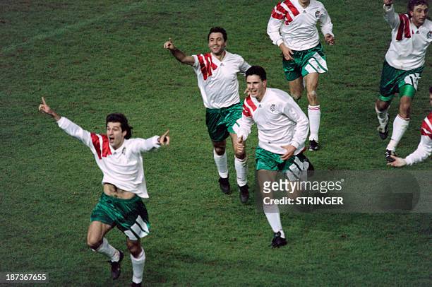 Bulgarian soccer players Emil Kostadinov, Hristo Stoichkov, Petar Alexandrov and Trifon Ivanov celebrate, during a qualification match for the world...