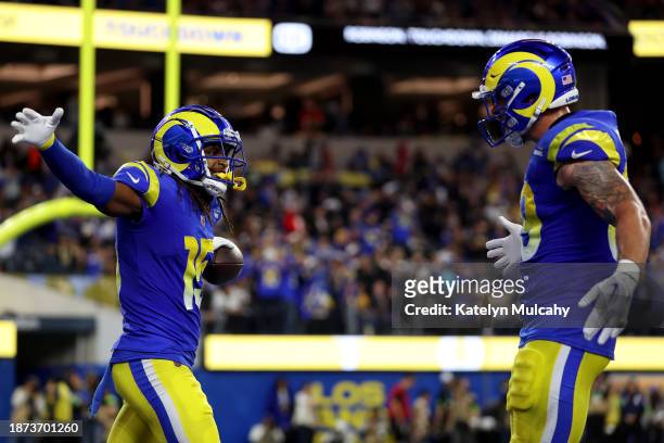 Demarcus Robinson of the Los Angeles Rams celebrates with Tyler Higbee after scoring a touchdown against the New Orleans Saints during the second...