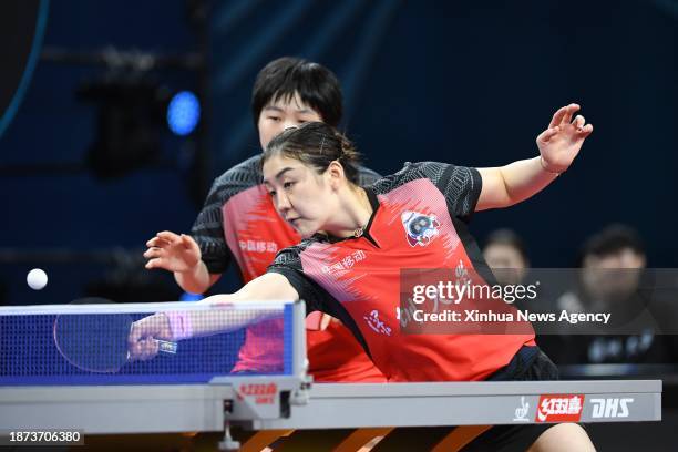 Kuai Man/Chen Meng R of Shenzhen compete against Fan Siqi/Qian Tianyi of Shandong Luneng during the women's team final match between Shandong Luneng...