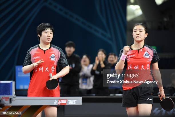 Kuai Man/Chen Meng R of Shenzhen celebrate after defeating Fan Siqi/Qian Tianyi of Shandong Luneng during the women's team final match between...