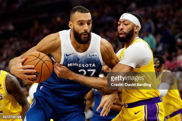 Rudy Gobert of the Minnesota Timberwolves goes to the basket while Anthony Davis of the Los Angeles Lakers defends in the first quarter at Target...