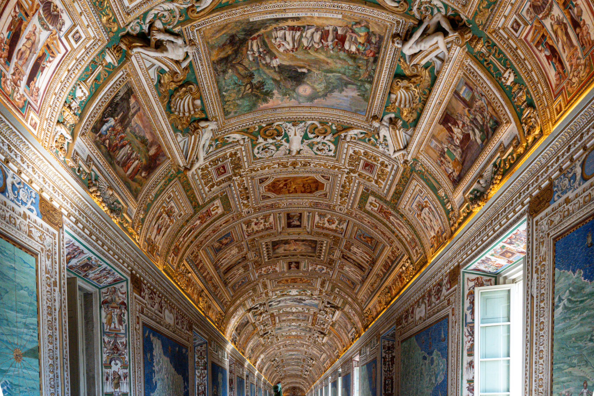 Vatican Museums - Gallery of the Geographical Maps with frescoes on the ceiling and walls Vatican Museums - Gallery of the Geographical Maps with frescoes on the ceiling and walls