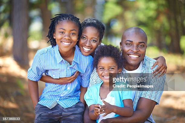 spending quality family time outdoors - four people stock pictures, royalty-free photos & images