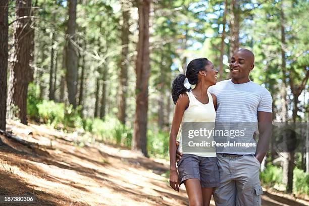 it's so beautiful out here... - young couple hiking stock pictures, royalty-free photos & images