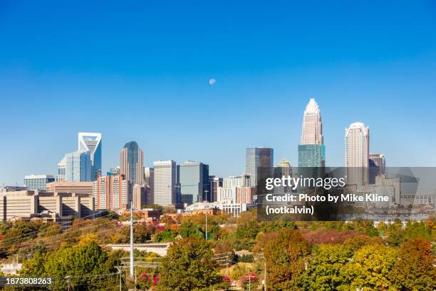 charlotte north carolina under a daytime moon - charlotte stock-fotos und bilder