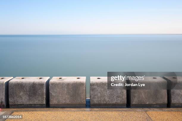 block shape seawall with long exposure - retaining wall stock pictures, royalty-free photos & images