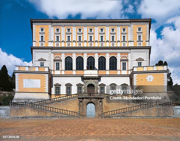 Italy, Lazio, Caprarola, Palazzo Farnese, All, The façade of the elegant pentagonal plan building, with the imperial staircase, pilasters and ashlar...