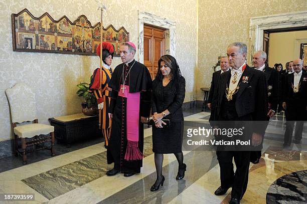 Costa Rica President Laura Chinchilla, flanked by Prefect of the Pontifical House and former personal secretary of Pope Benedict XVI Georg Ganswein,...