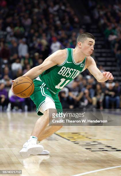 Payton Pritchard of the Boston Celtics dribbling the ball looks to drive towards the basket against the Sacramento Kings during the first half of an...