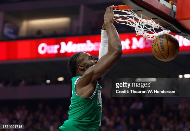 Jaylen Brown of the Boston Celtics slam dunks against the Sacramento Kings during the first half of an NBA basketball game at Golden 1 Center on...
