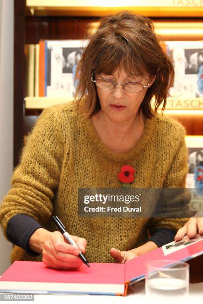 Jane Birkin sign copies of her new book 'Jane & Serge' at Taschen Store on November 8, 2013 in London, England.